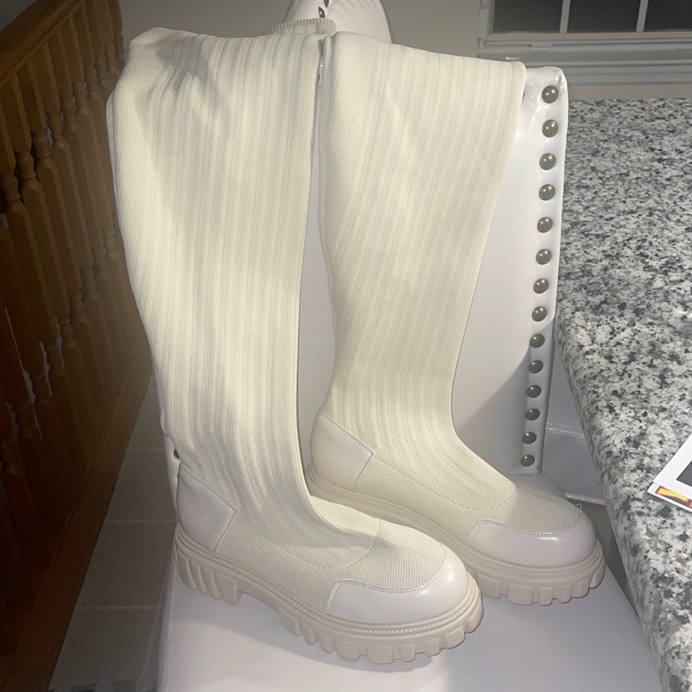 Thigh high sweater boots